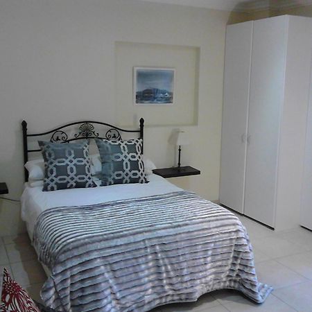 Hotel Port House à Bloubergstrand Extérieur photo