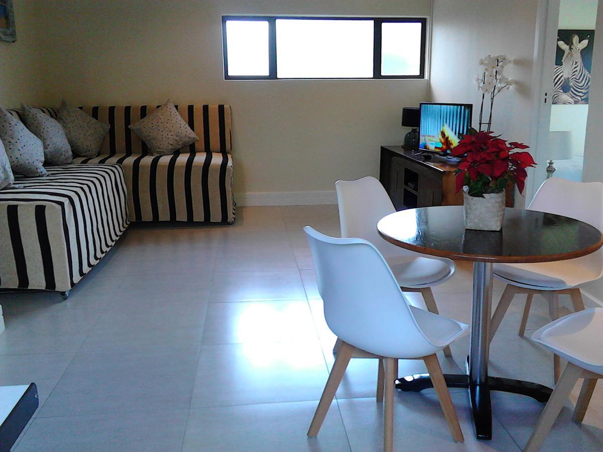 Hotel Port House à Bloubergstrand Extérieur photo