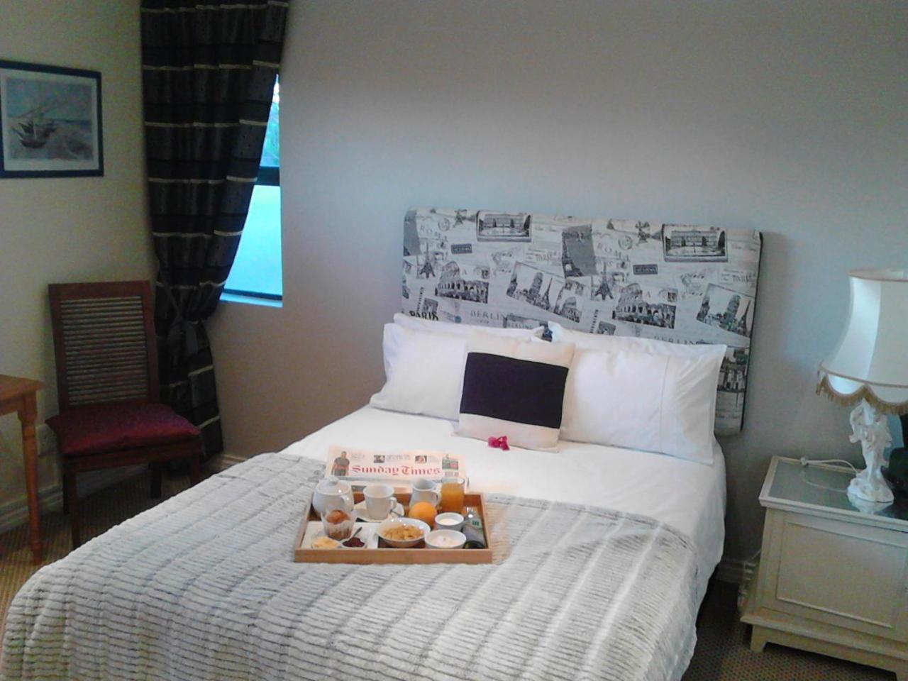 Hotel Port House à Bloubergstrand Extérieur photo