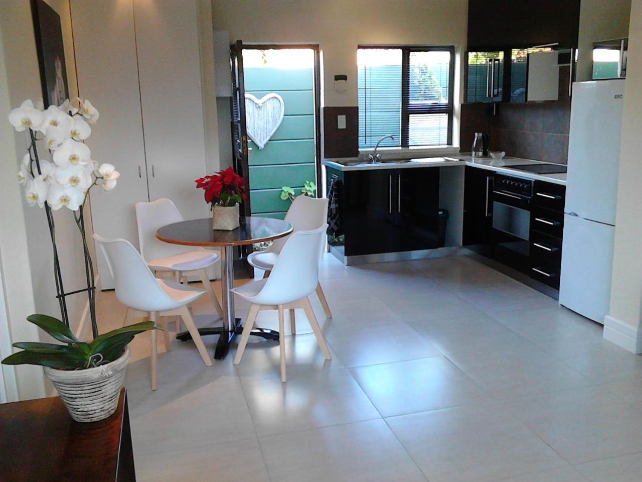 Hotel Port House à Bloubergstrand Extérieur photo